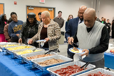 People in line getting food at the Martin Luther King Jr. Breakfast event at John A. Logan College.