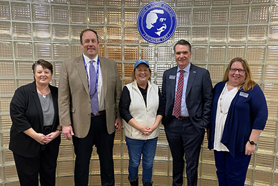 Southeastern Illinois College President Dr. Karen Weiss, Kaskaskia College President Dr. George Evans, Senator Terri Bryant, John A. Logan College President Dr. Kirk Overstreet, and JALC Assistant Director of Legislative Affairs Jennifer Fuller in the JALC Board Room.